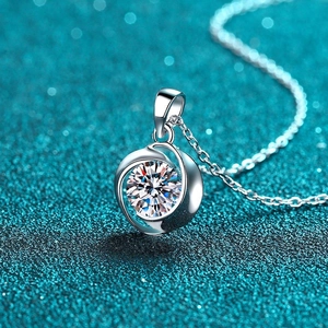S925 sterling silver necklace featuring a sparkling round moissanite pendant in a swirl design