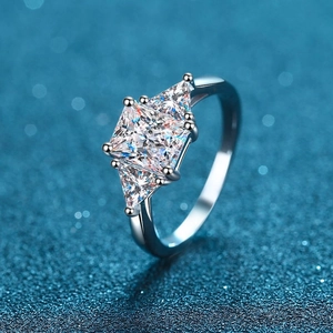 Exquisite S925 silver ring featuring three kite-cut moissanite stones in a luxury prong setting