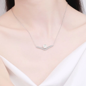 Elegant S925 silver V-shaped necklace with 8mm freshwater pearl and moissanite stones