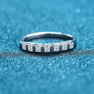 Elegant S925 sterling silver band ring featuring seven square cut moissanite stones