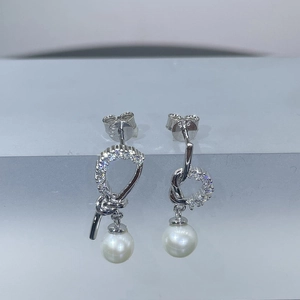 Elegant S925 sterling silver twist knot earrings with freshwater pearls and cubic zirconia