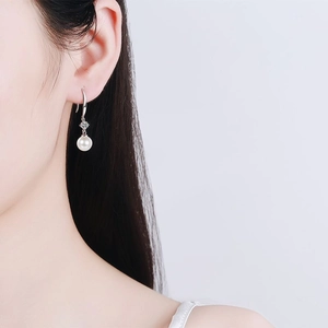 Elegant S925 sterling silver earrings with 8mm freshwater pearls and moissanite studs