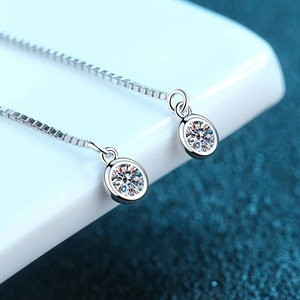 Elegant S925 sterling silver tassel drop earrings featuring sparkling round moissanite
