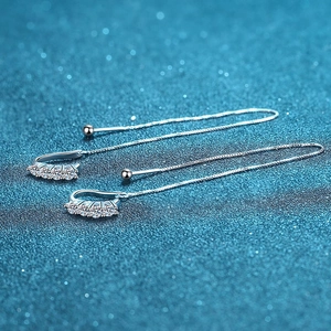 Elegant S925 sterling silver drop earrings with crystals on a deep blue starry background