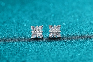 Macro view of S925 sterling silver stud earrings with moissanite pave cluster setting