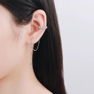 Elegant S925 silver ear cuff with chain and zircons shown on an Asian female model