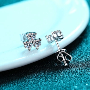 Elegant 925 sterling silver clover earrings featuring three brilliant moissanite stones
