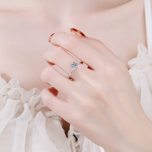 Elegant 925 sterling silver snowflake ring with brilliant moissanite stone on finger
