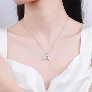 S925 sterling silver mermaid tail necklace with sparkling moissanite on female model