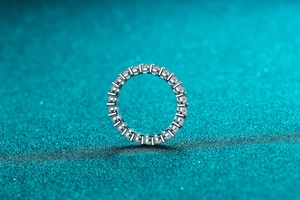 Macro view of S925 sterling silver eternity ring with sparkling moissanite stones