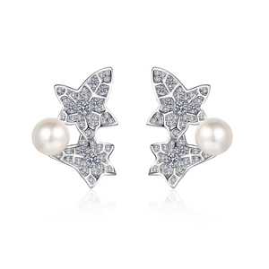 S925 sterling silver earrings with pearl and moissanite leaf design on white background