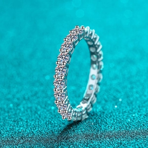 Elegant S925 sterling silver eternity ring featuring brilliant round moissanite stones