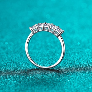 Elegant S925 sterling silver ring featuring five emerald cut moissanite stones in a row