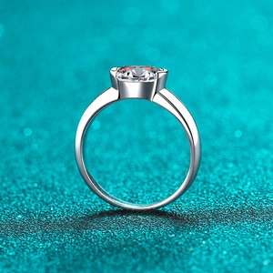 Elegant S925 sterling silver solitaire ring featuring a round brilliant cut moissanite stone