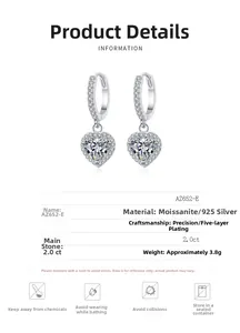 Macro detail of S925 sterling silver heart earrings with 2ct moissanite stones