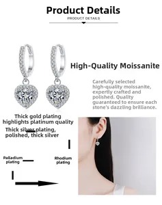 Macro detail of S925 sterling silver heart earrings featuring moissanite pave setting