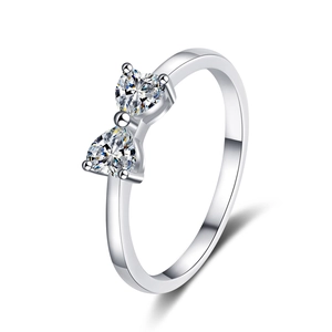 S925 sterling silver ring with two heart-shaped moissanite stones in bow design
