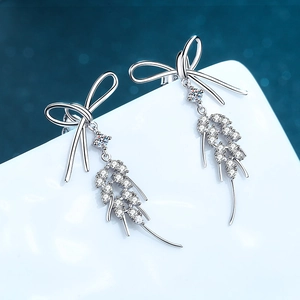 925 silver bow stud earrings with sparkling moissanite wheat charms in mirror finish