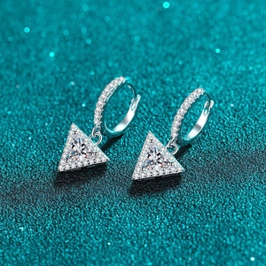 Elegant S925 sterling silver triangle moissanite hoop earrings on a blue glitter background