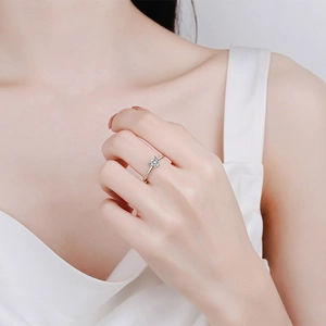 Elegant S925 sterling silver ring featuring a heart-cut moissanite stone on finger