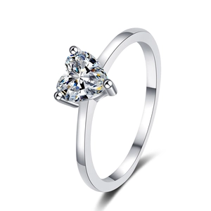 Elegant S925 sterling silver ring with a heart-shaped moissanite stone on a white background