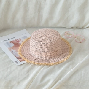 Flat top pale pink woven straw sun hat with frayed brim for women summer beach travel