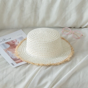 Summer wide brim straw sun hat with frayed edges for beach vacations and outdoor travel