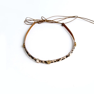 Leopard print choker necklace with gold star pendant and adjustable brown ties