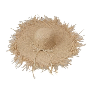 Bohemian raffia straw sun hat with large fringed brim and decorative beaded strap