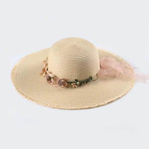 Wide brim straw sun hat with floral silk ribbon and frayed edges for beach vacation
