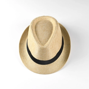 Straw Panama jazz hat for beach vacations featuring black ribbon band on top view