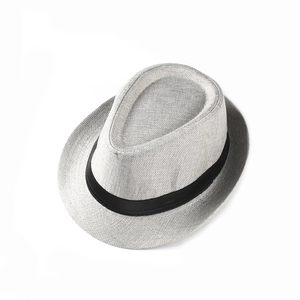 Macro shot of fine weave texture on a light gray linen fedora with black ribbon trim