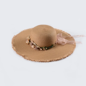 Classic wide brim straw hat with floral ribbon and fringe edges for beach vacation