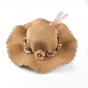 Women's wide brim straw sun hat with decorative fabric roses for summer beach vacation