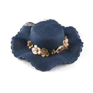 Navy blue wide-brim woven straw sun hat for women with floral ribbon and scalloped edges