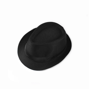 Detail of black woven linen fedora hat featuring a breathable mesh texture and ribbon