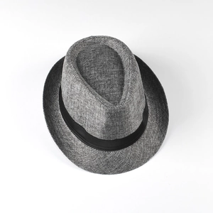 Close-up of dark grey linen fedora hat showing weave texture and black satin ribbon