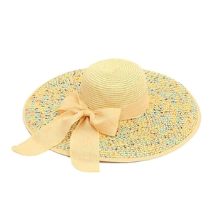 Women's wide brim straw sun hat with colorful woven dots and a large beige bow accent