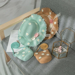 Girls straw hat and matching bag set with lace and daisy floral details for summer vacations