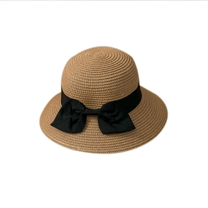 Kids woven straw sun hat with large black ribbon bow for summer beach travel