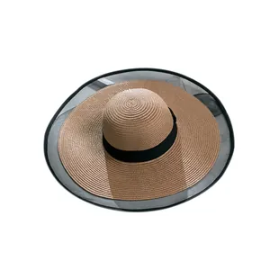 Breathable wide brim straw sun hat for women with black mesh edge and ribbon detail