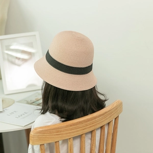 Japanese style woven straw sun hat for girls with black ribbon trim and beige fisherman brim