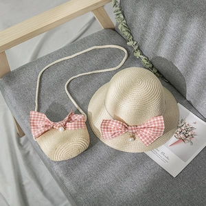 Girl's straw sun hat and matching crossbody bag with pink gingham bows and pearl charms