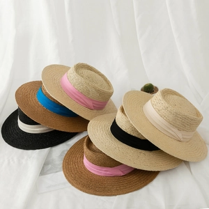 Flat top straw boater hats with colorful ribbon bands for summer beach vacations