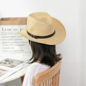 Unisex wide brim straw sun hat with black leather band and metal buckle for beach travel