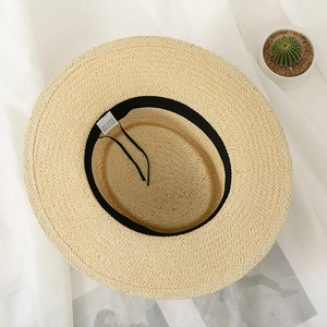 Detail of 100% paper straw boater hat with adjustable inner sweatband and weave texture