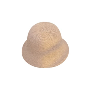 Minimalist light brown straw bucket hat with a wide brim and spiral woven pattern for women
