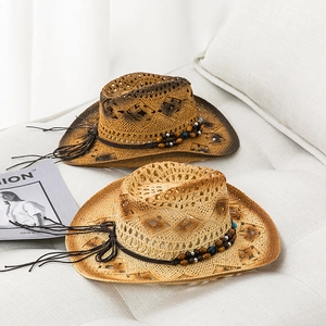Straw cowboy hats in tan and brown with beaded bands for beach and outdoor style