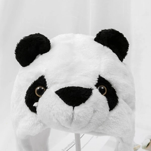 Close-up of the soft plush material and cute panda features on this warm winter hat