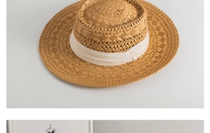 Detailed texture of handmade straw Panama hat with elegant cream ribbon trim